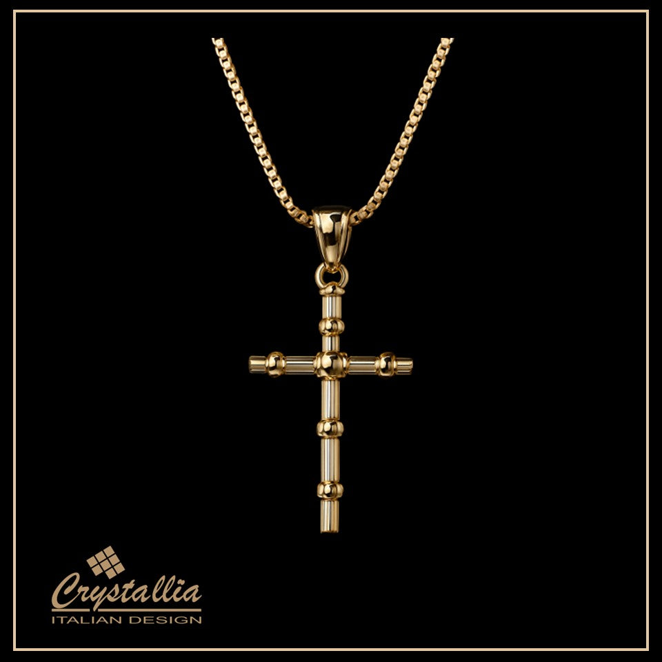 Gold cross necklace on a black background with Crystallia branding.
