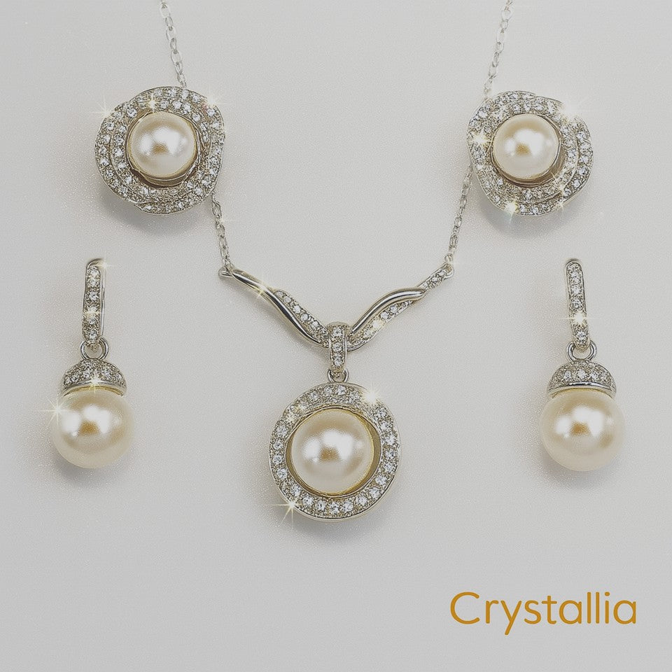 Pearl jewelry set with necklace and earrings on a light gray background, featuring the brand 'Crystallia'.