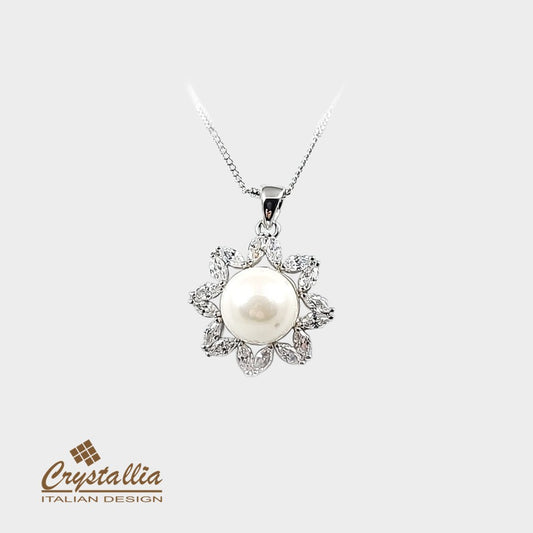 Pearl necklace with decorative elements on a white background, featuring the Crystallia brand.