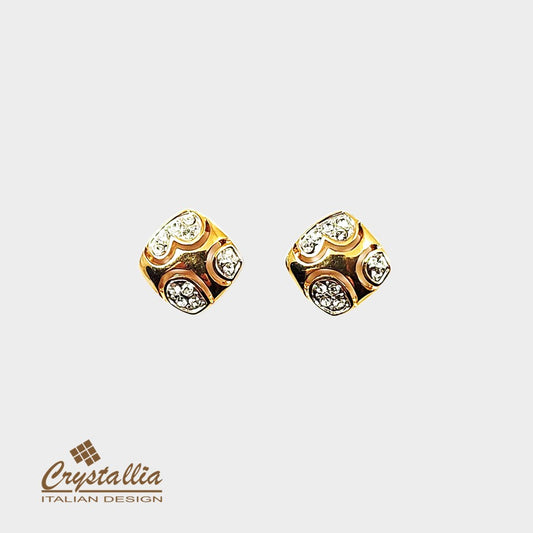 Gold earrings with embedded crystals on a light gray background, featuring the Crystallia brand.