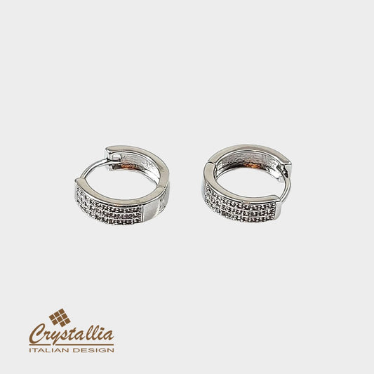 Silver hoop earrings with Crystallia logo on a white background