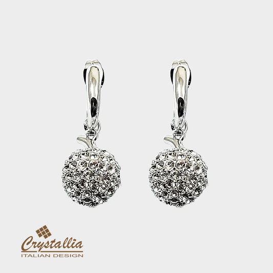 Heart-shaped earrings with Crystallia branding on a white background