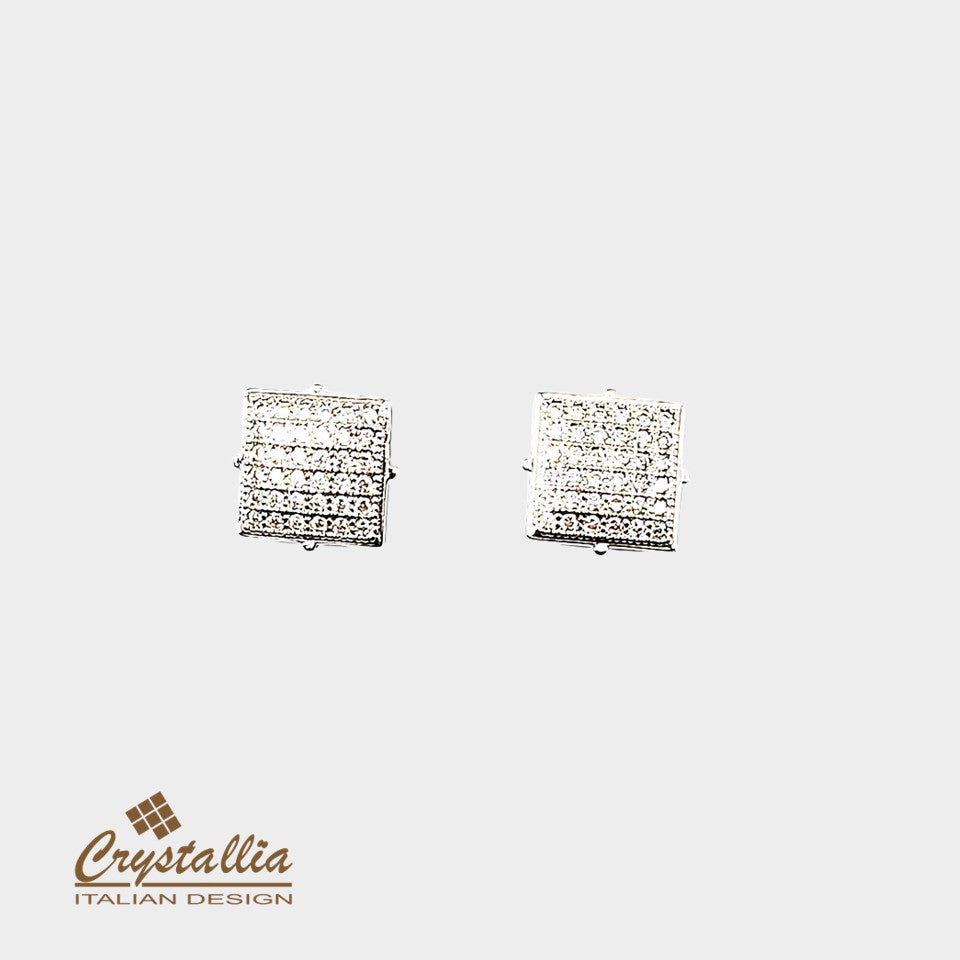 Pair of square crystal earrings on a light gray background with Crystallia logo.
