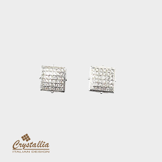 Pair of square crystal earrings on a light gray background with Crystallia logo.
