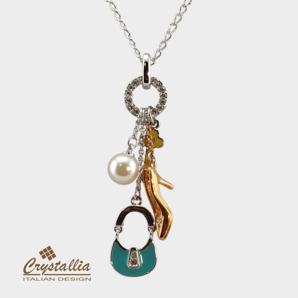 Necklace with charms on a white background, featuring the Crystallia brand.