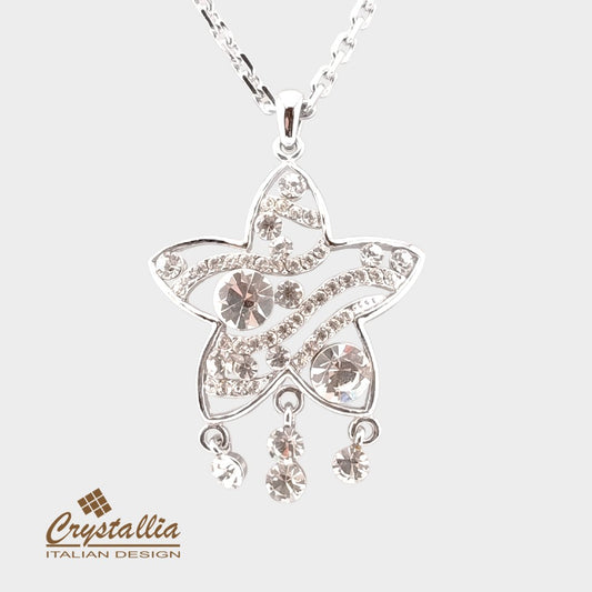 Star-shaped pendant with crystals on a white background, featuring the Crystallia brand.