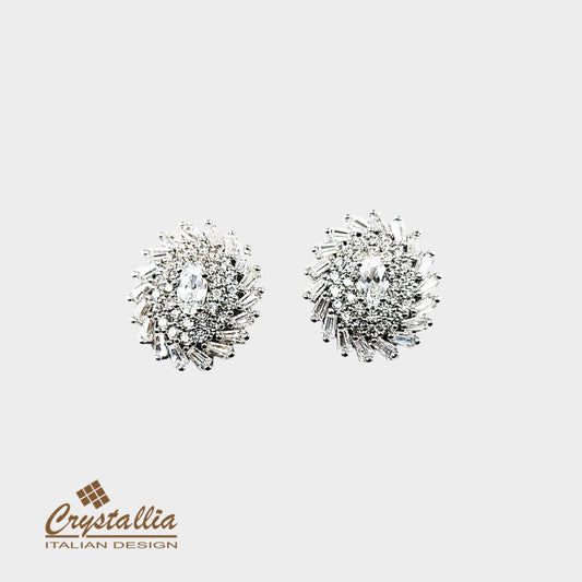 Pair of silver earrings with 'Crystallia' branding on a light gray background