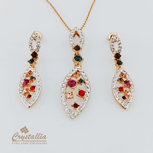 Jewelry set with earrings and a necklace featuring multicolored gemstones on a light gray background.