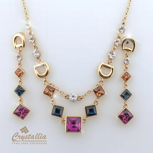 Necklace with colorful gemstones and gold accents on a white background, featuring the Crystallia brand.