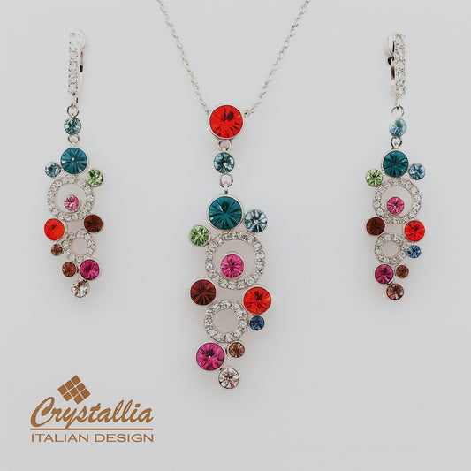 Colorful jewelry set with Crystallia branding on a white background